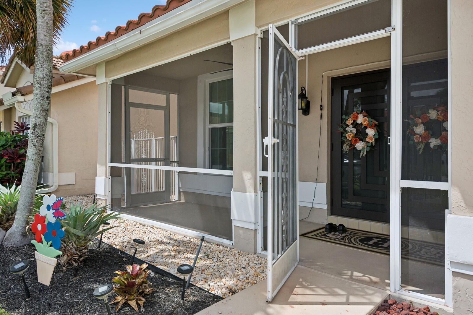 18287 Clear Brook Circle Boca Raton, FL 33498 - Photo 3 of 30 a view of a entryway door front of house