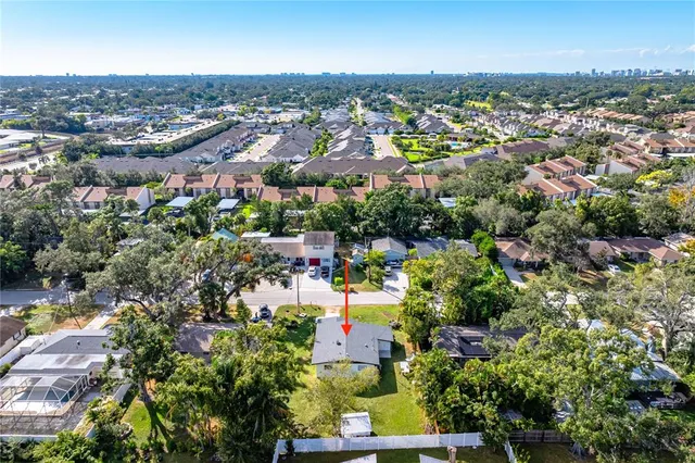 an aerial view of a city with lots of residential buildings