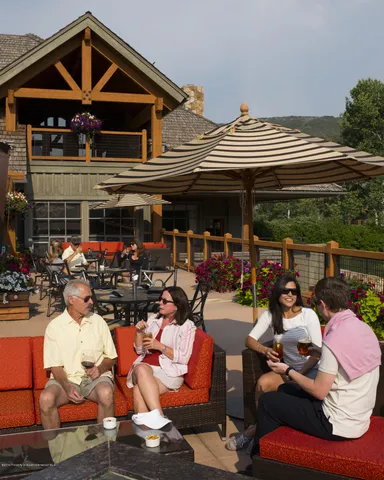 a view of a chairs and tables in patio