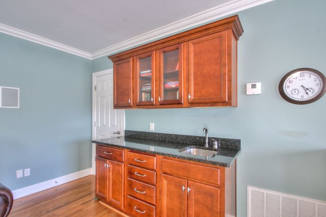 a view of play room with clothes and shoes