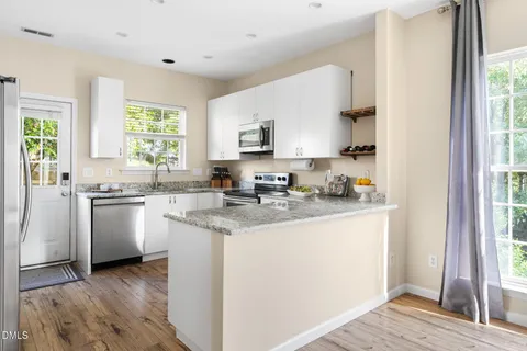 $410,000 | 4917 Delta Lake Drive, Raleigh, NC 27612