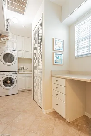 a view of cabinets and window