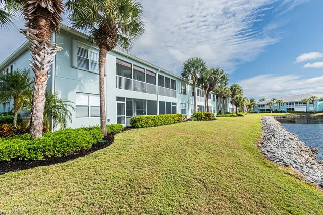 a house with river in front of it