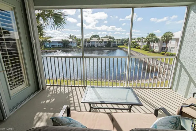 a view of a balcony with wooden floor