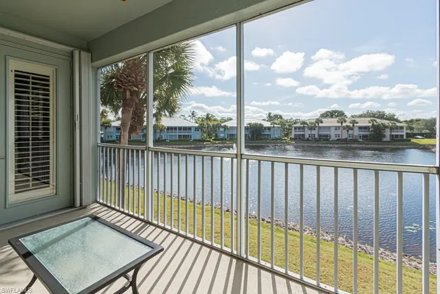 a view of a balcony with wooden floor