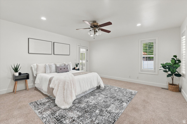 689 Apple Drive Logan, UT 84321 - Photo 16 of 52 Spacious room with plush carpeting, recessed lighting, and a ceiling fan