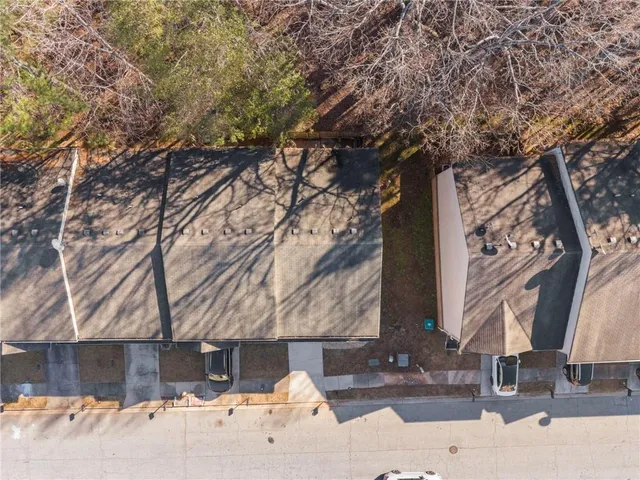 a building with trees in front of it