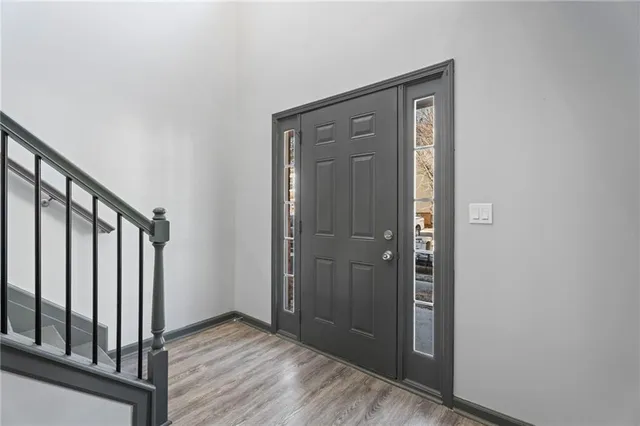 a view of front door with hallway