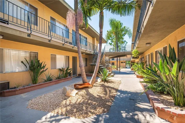 a view of a backyard with a table and chair