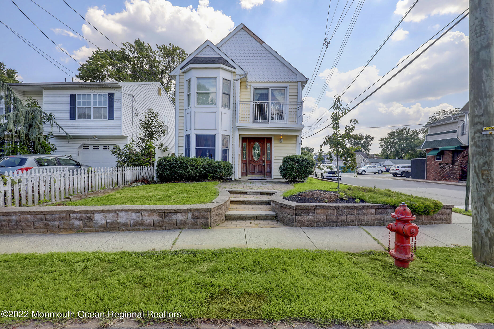 100 Maple Place Keyport, NJ 07735 - Photo 2 of 35 a front view of house with yard and outdoor seating