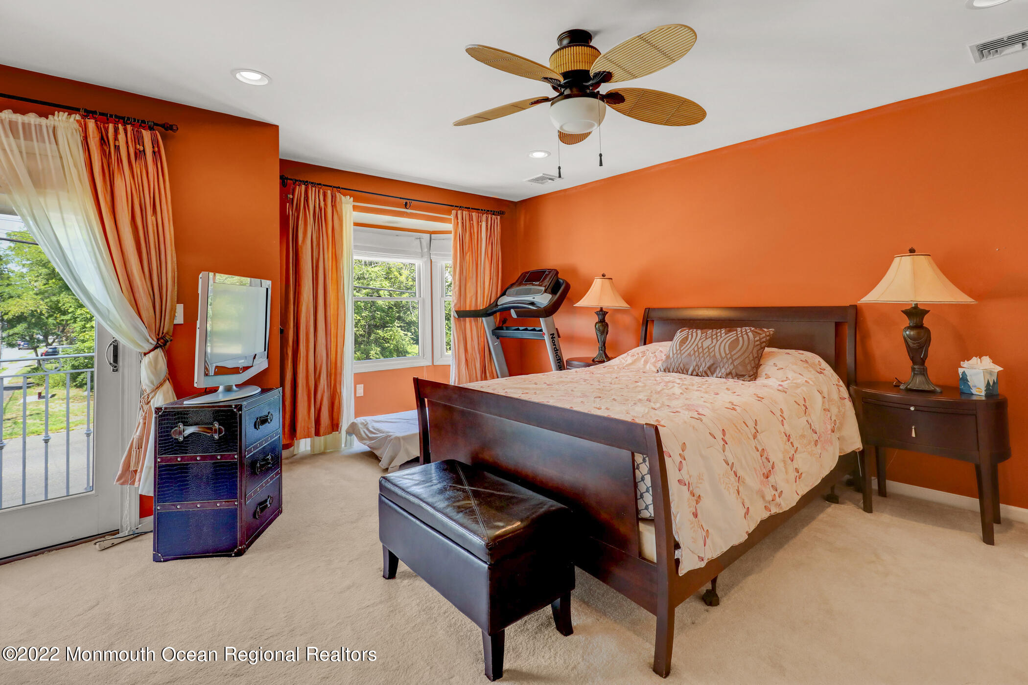 100 Maple Place Keyport, NJ 07735 - Photo 21 of 35 a bedroom with a bed and a chandelier