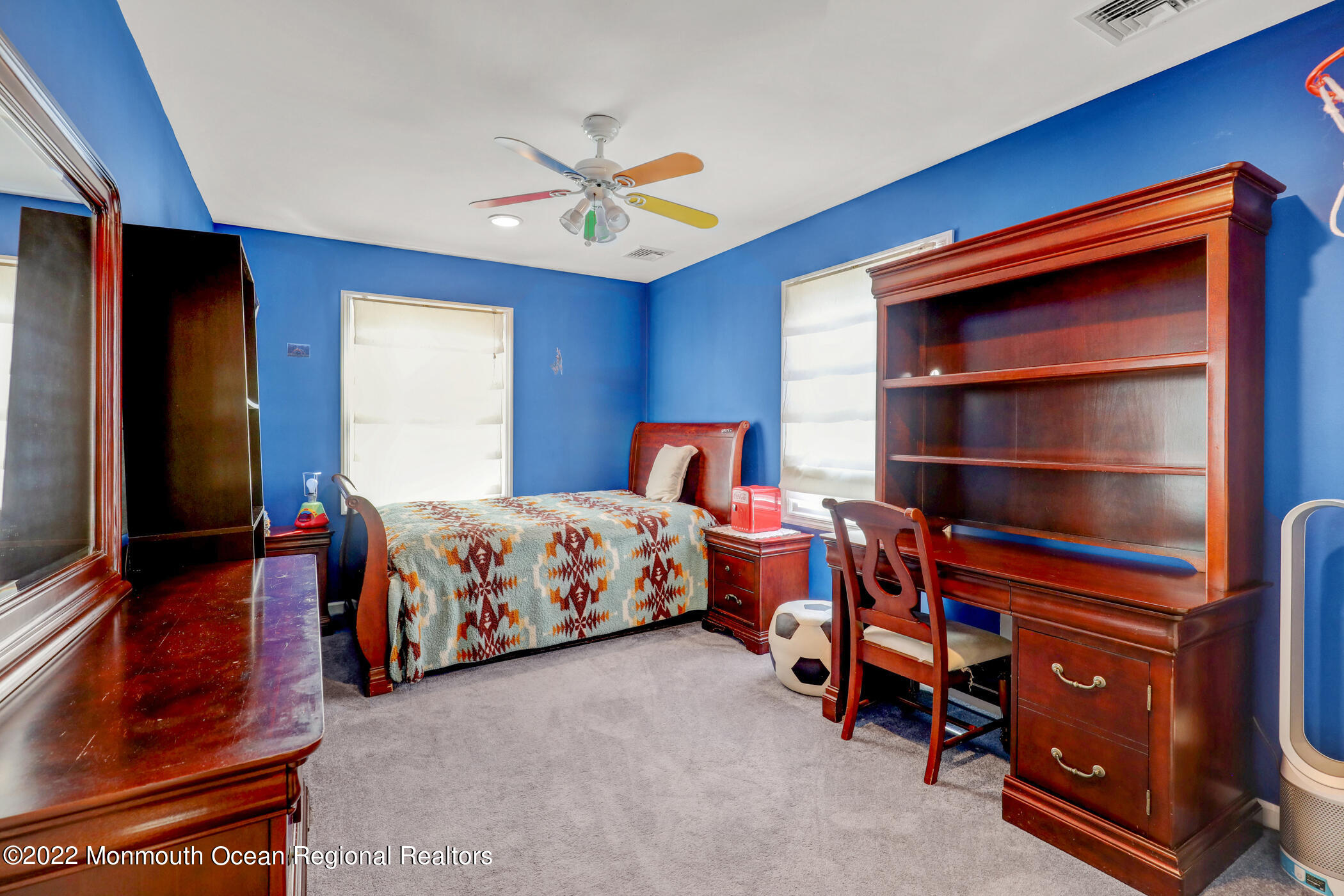 100 Maple Place Keyport, NJ 07735 - Photo 22 of 35 a bedroom with a bed and a flat screen tv