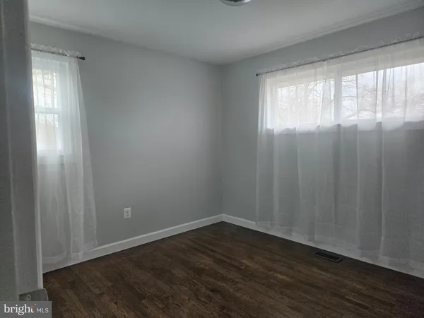 a view of a yard with an outdoor space