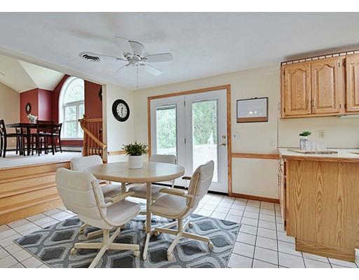 14 Bear Hill Road Billerica, MA 01821 - Photo 12 of 25 a view of a dining room with furniture and chandelier