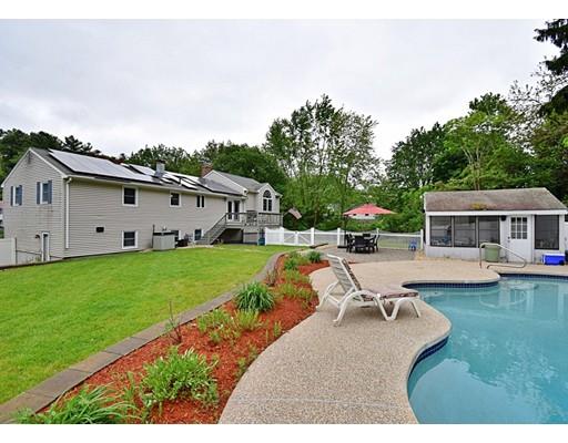 14 Bear Hill Road Billerica, MA 01821 - Photo 3 of 25 a view of a house with backyard sitting area and garden