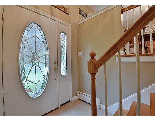 14 Bear Hill Road Billerica, MA 01821 - Photo 6 of 25 a view of a livingroom with wooden floor and windows