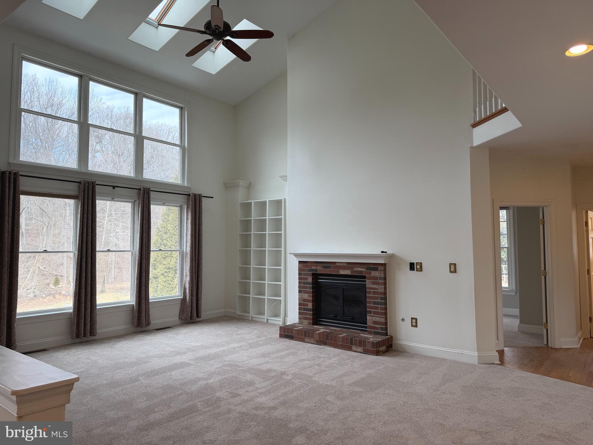 1 Nob Hill Road Wilmington, DE 19808 - Photo 15 of 75 an empty room with windows and fireplace