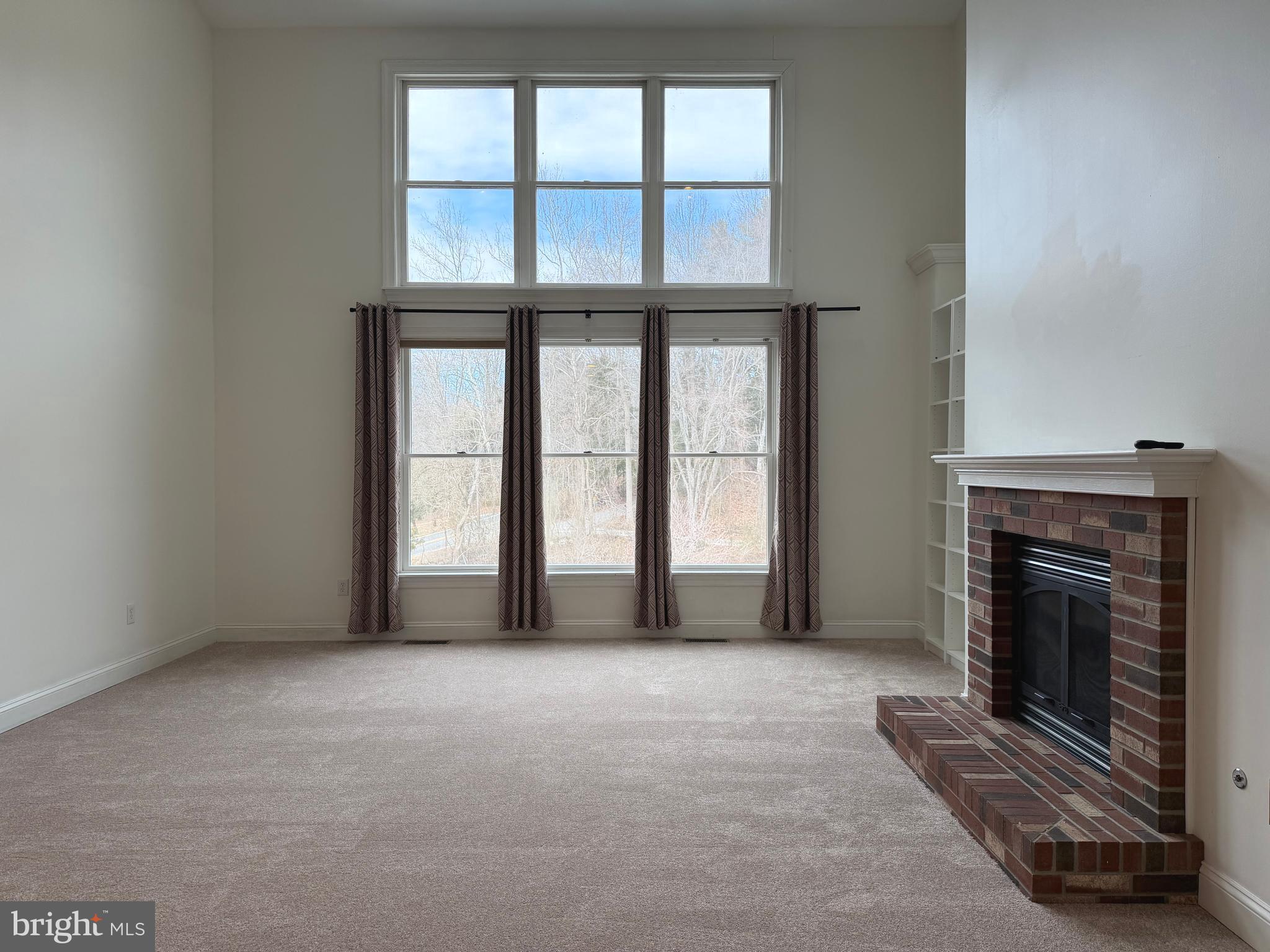1 Nob Hill Road Wilmington, DE 19808 - Photo 16 of 75 a view of empty room with a fireplace