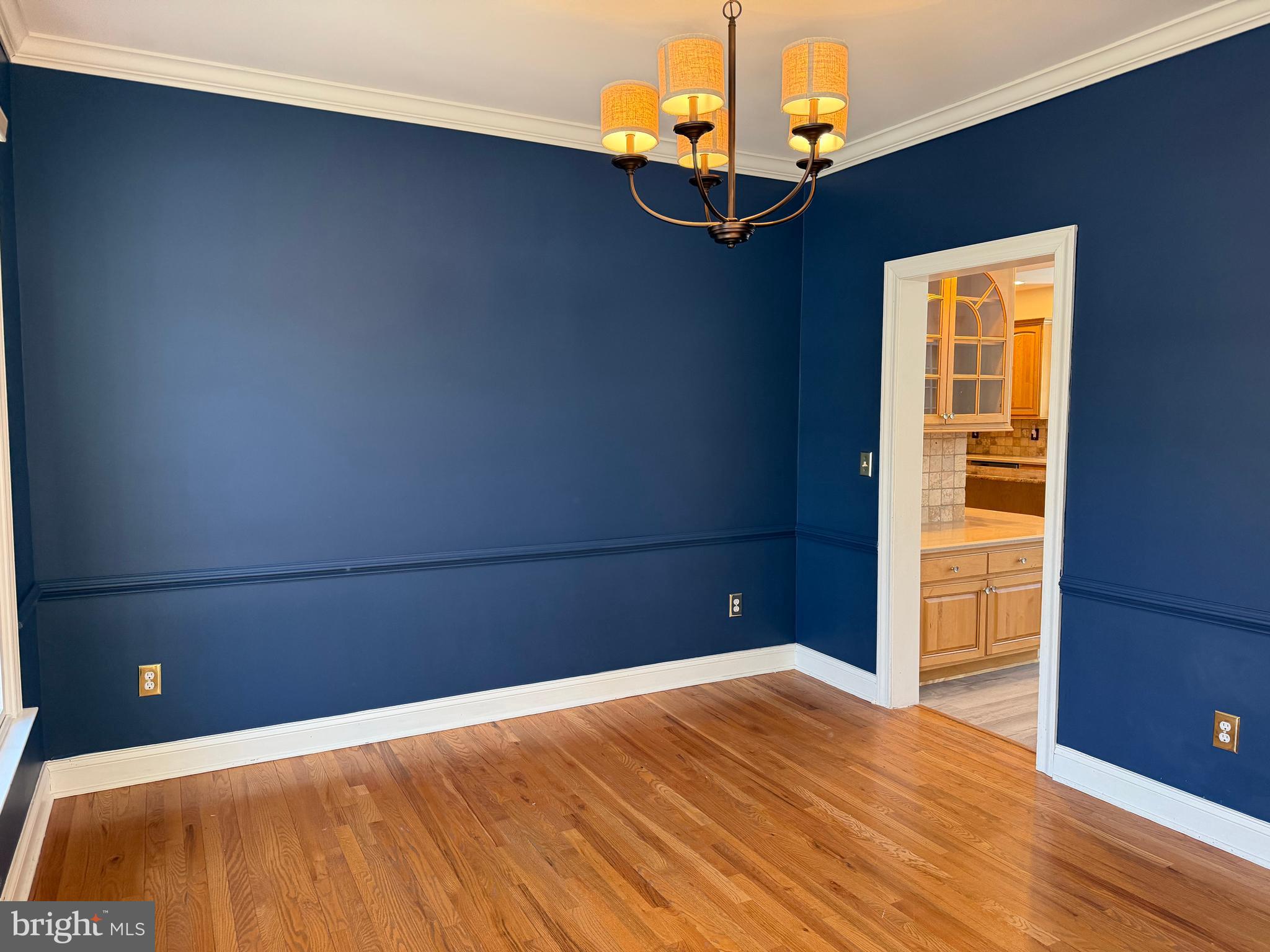 1 Nob Hill Road Wilmington, DE 19808 - Photo 22 of 75 a bedroom with a bed and a chandelier