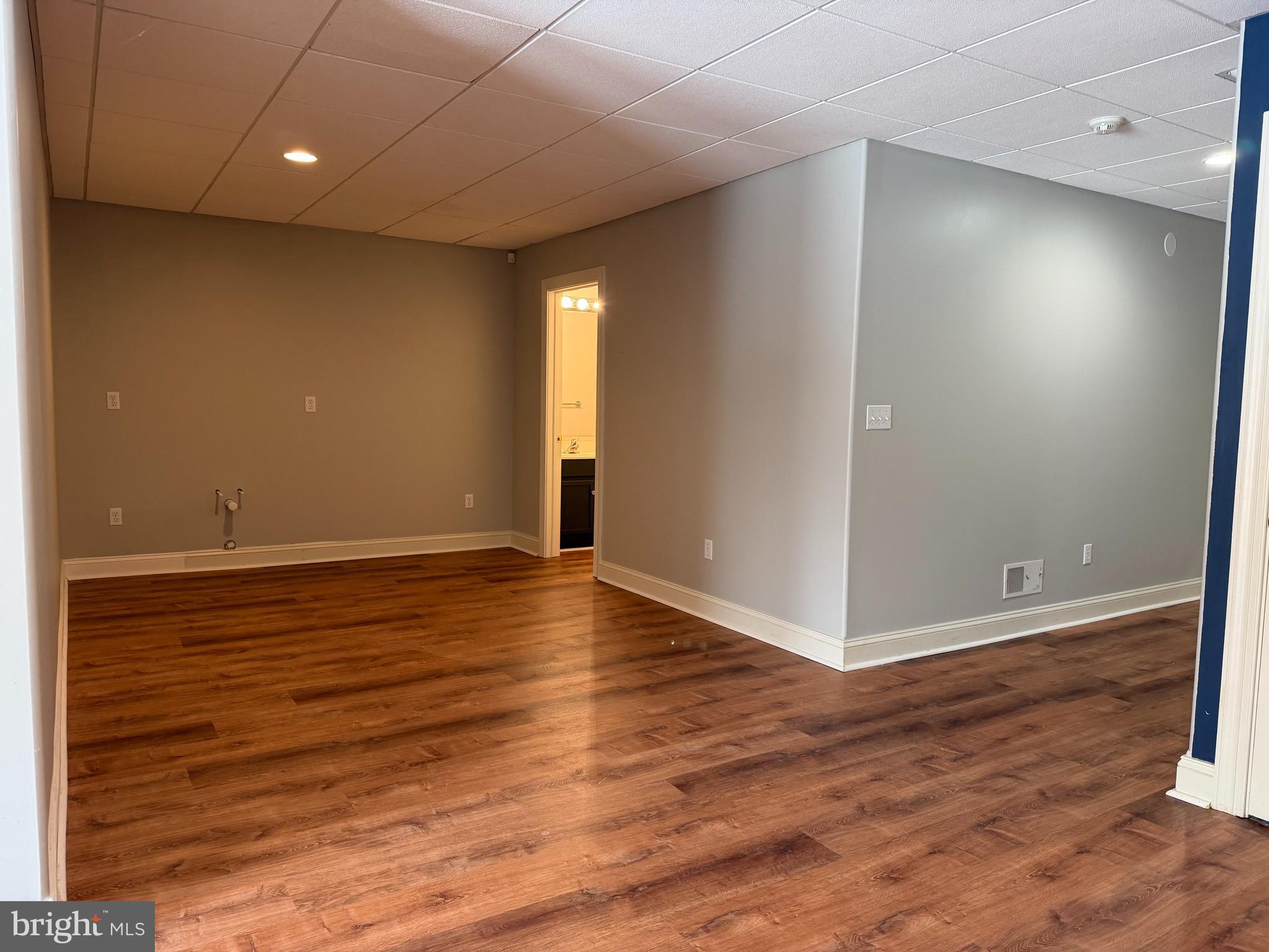 1 Nob Hill Road Wilmington, DE 19808 - Photo 55 of 75 an empty room with wooden floor and entrance
