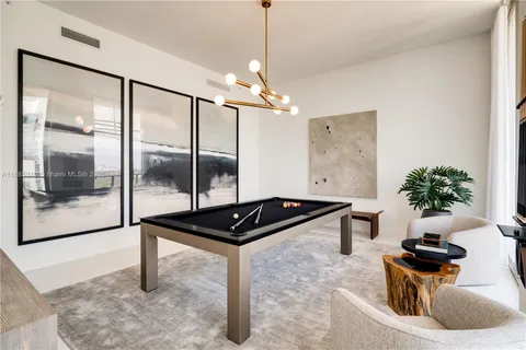 a bedroom with bed and a couch