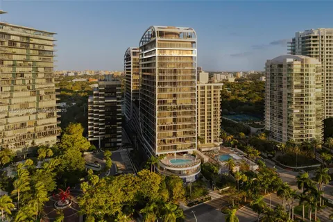 a front view of a building with a yard