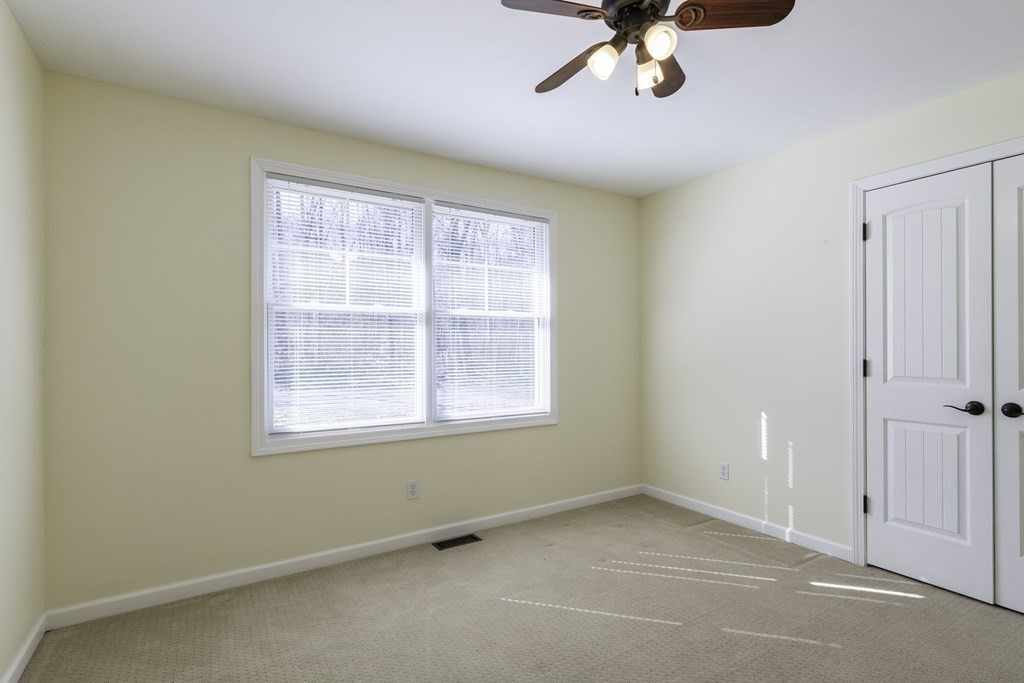 124 Southampton Road Westhampton, MA 01027 - Photo 15 of 25 an empty room with a window