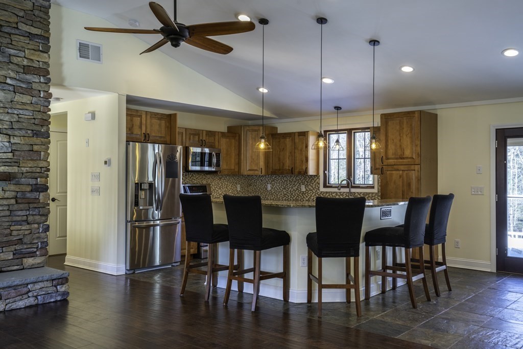 124 Southampton Road Westhampton, MA 01027 - Photo 6 of 25 a view of a dining room with furniture and wooden floor