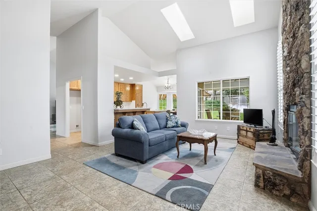 a bath room with a sink and a large mirror