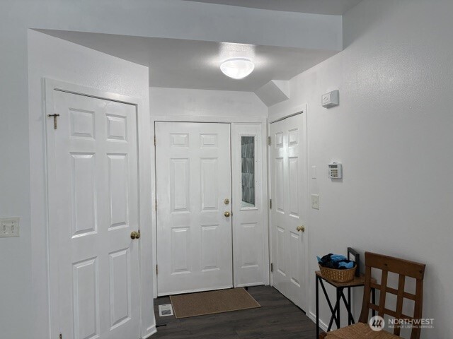 714 228th Street Southwest, Unit O101 Bothell, WA 98021 - Photo 5 of 28 a view of room with hardwood floor and hallway