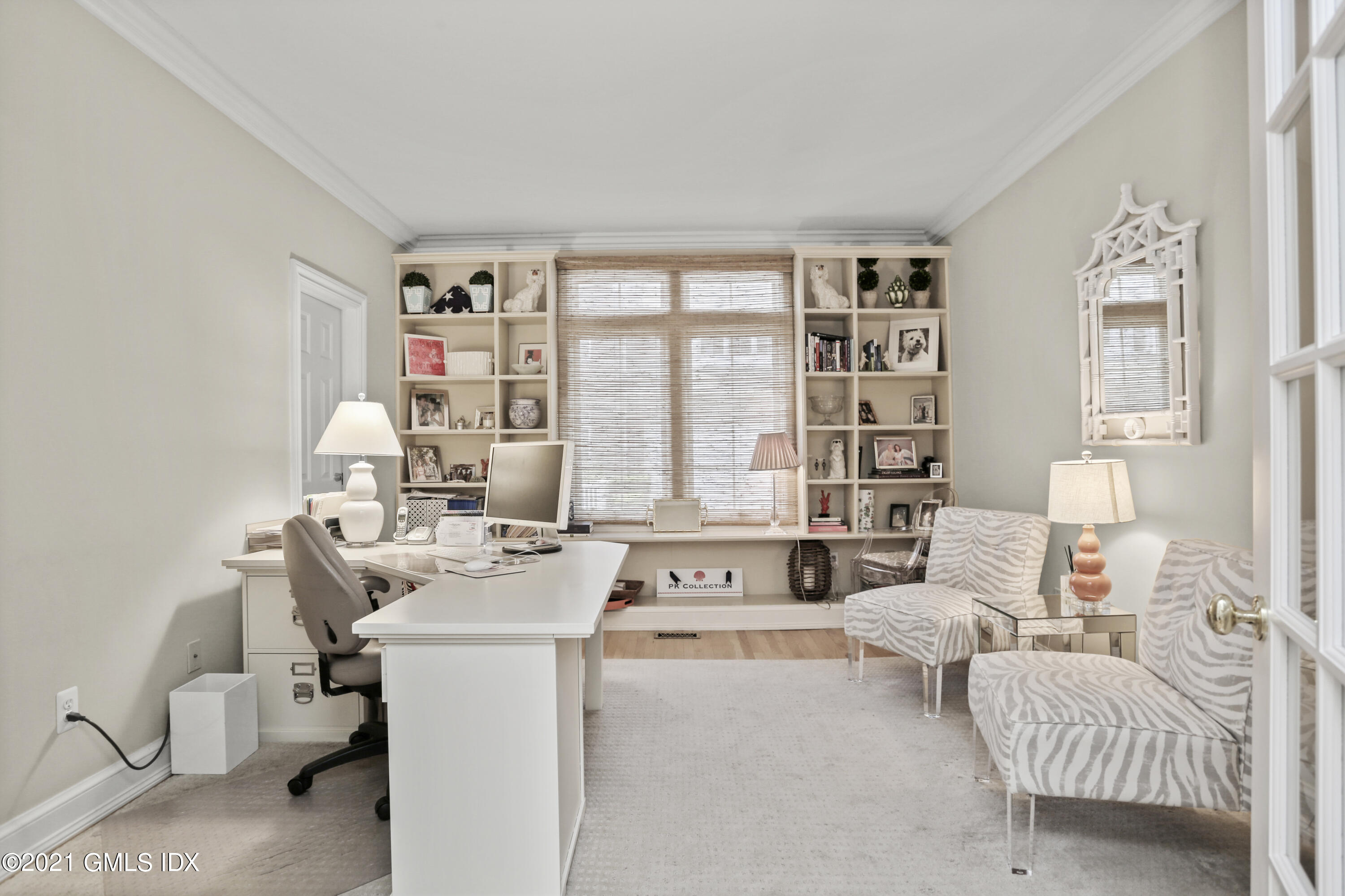 73 Weaver Street, Unit 4 Greenwich, CT 06831 - Photo 16 of 35 a living room with furniture and a window
