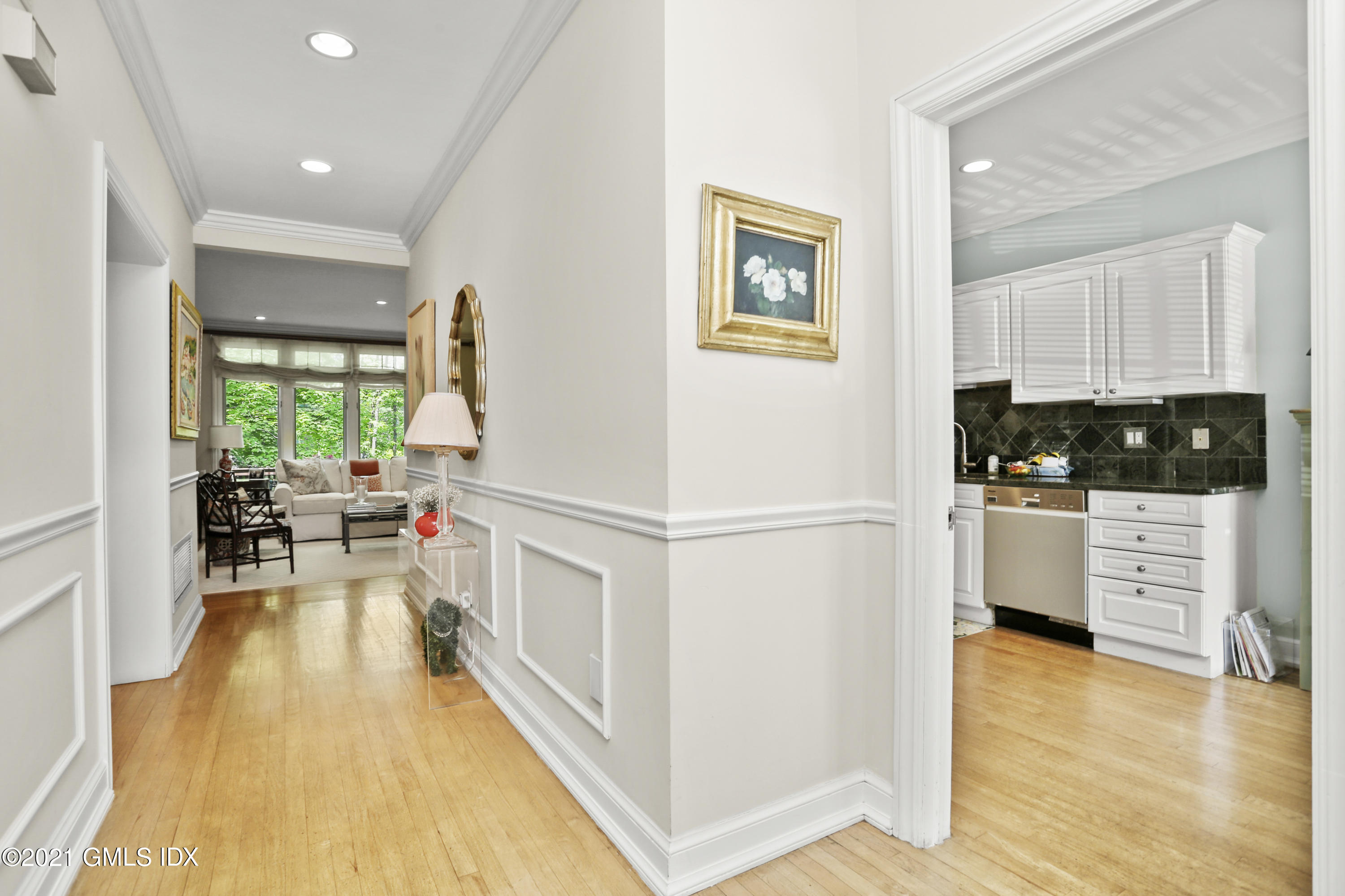 73 Weaver Street, Unit 4 Greenwich, CT 06831 - Photo 9 of 35 a kitchen with stainless steel appliances a stove a refrigerator a sink a stove and white cabinets