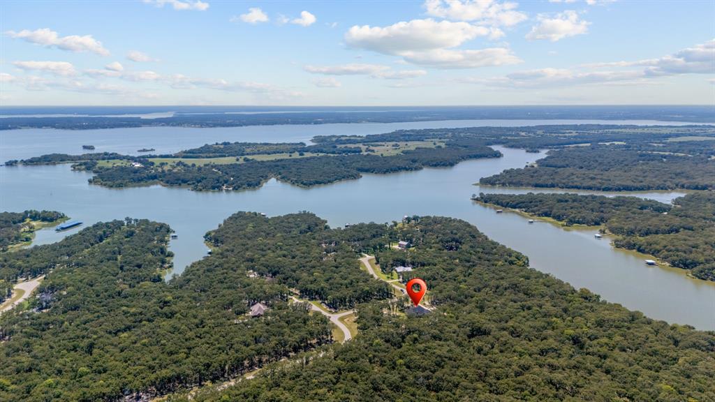 Tbd Tbd Anchor Point Quinlan, TX 75474 - Photo 35 of 40 an aerial view of a houses with ocean view