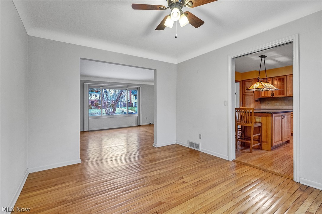 2990 Hampton Road Cleveland, OH 44120 - Photo 10 of 29 Empty room featuring ceiling fan and light wood-style floors
