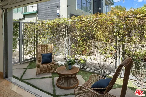 a backyard of a house with seating space