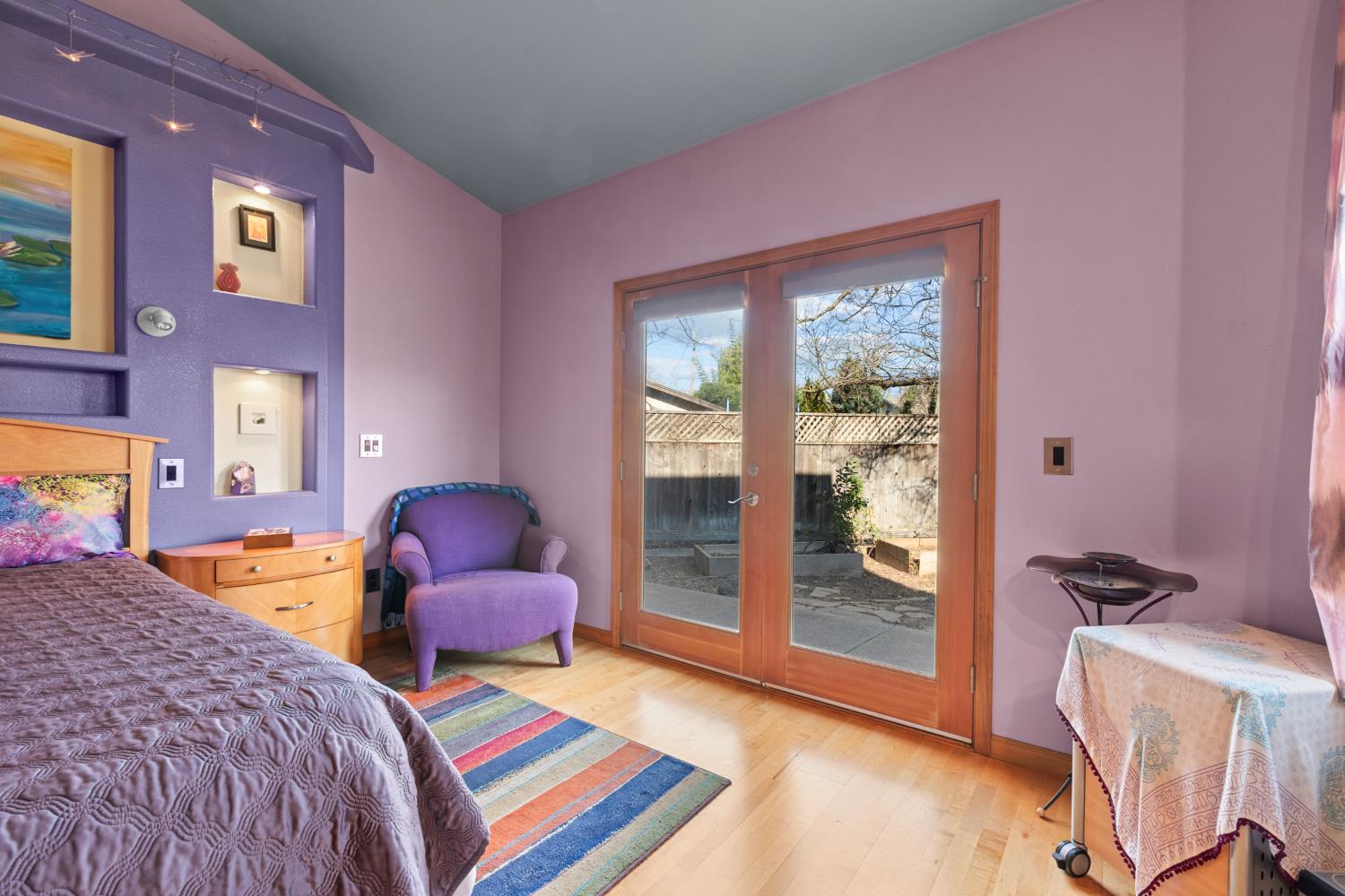 4838 Robertson Avenue Carmichael, CA 95608 - Photo 18 of 52 a bedroom with bed and wooden floor