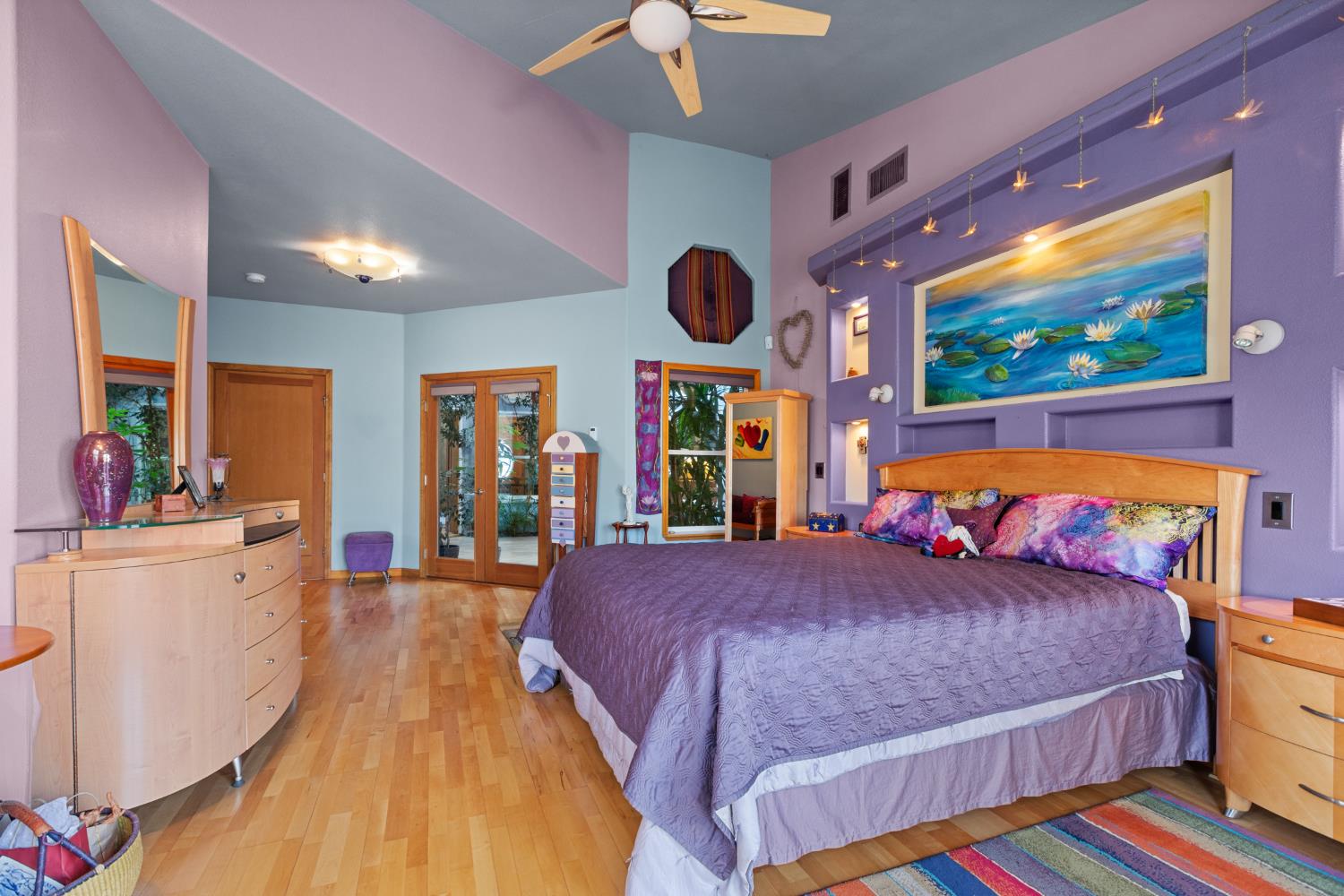 4838 Robertson Avenue Carmichael, CA 95608 - Photo 19 of 52 a bedroom with a bed and wooden floor