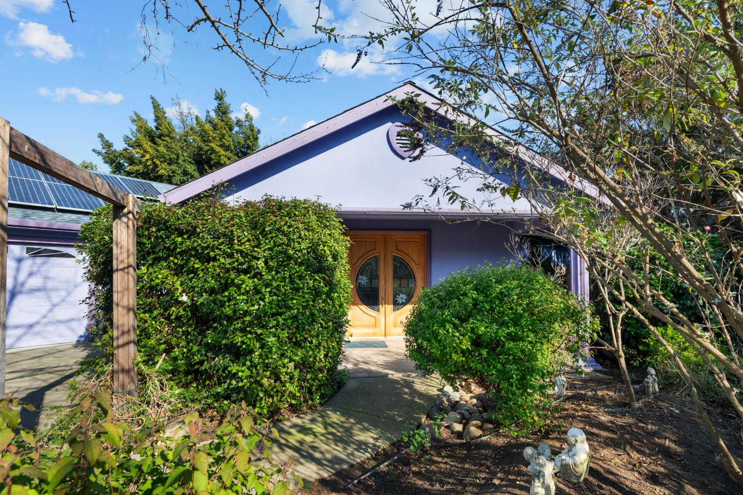 4838 Robertson Avenue Carmichael, CA 95608 - Photo 2 of 52 a front view of a house with a garden