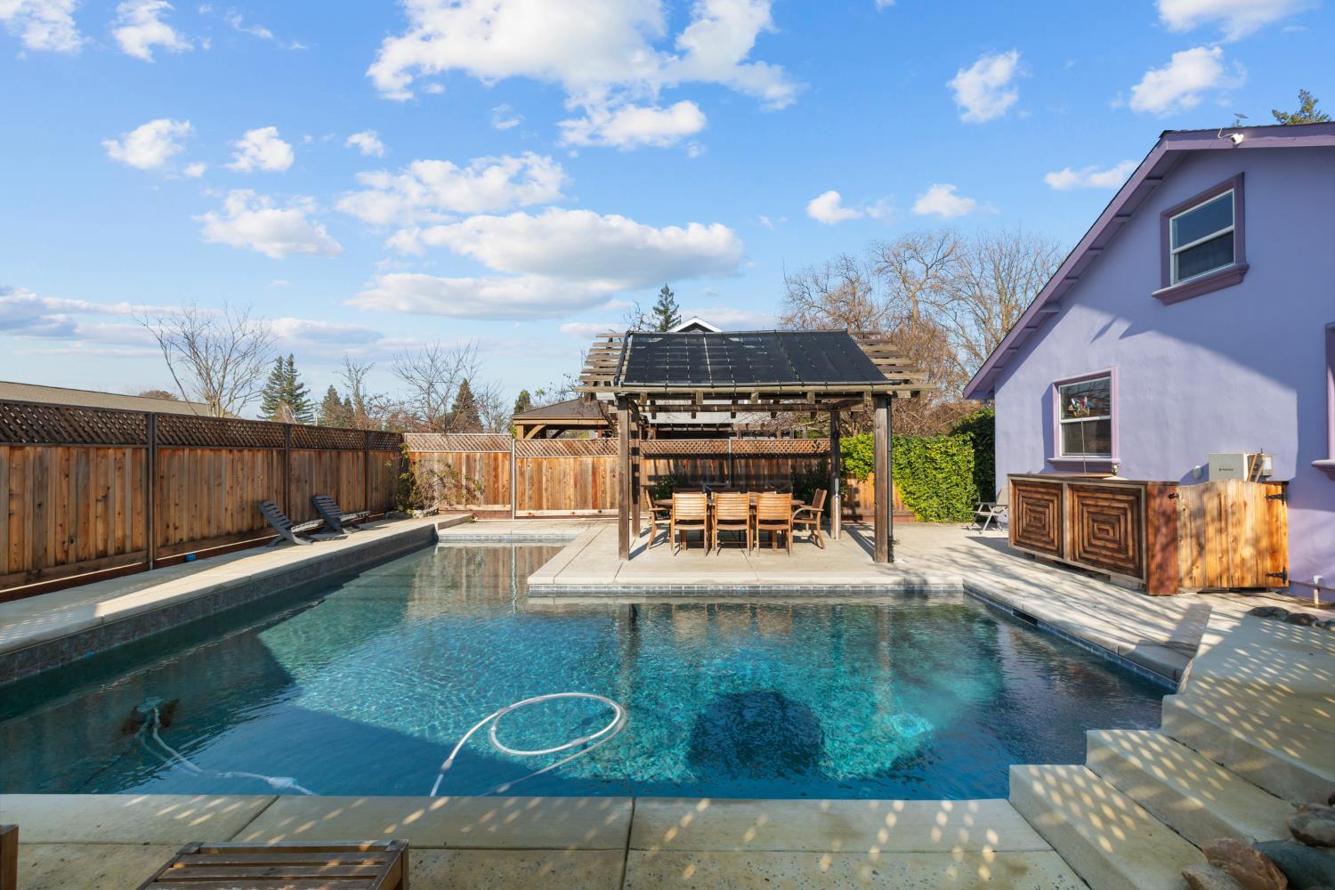 4838 Robertson Avenue Carmichael, CA 95608 - Photo 39 of 52 a view of a swimming pool with a patio