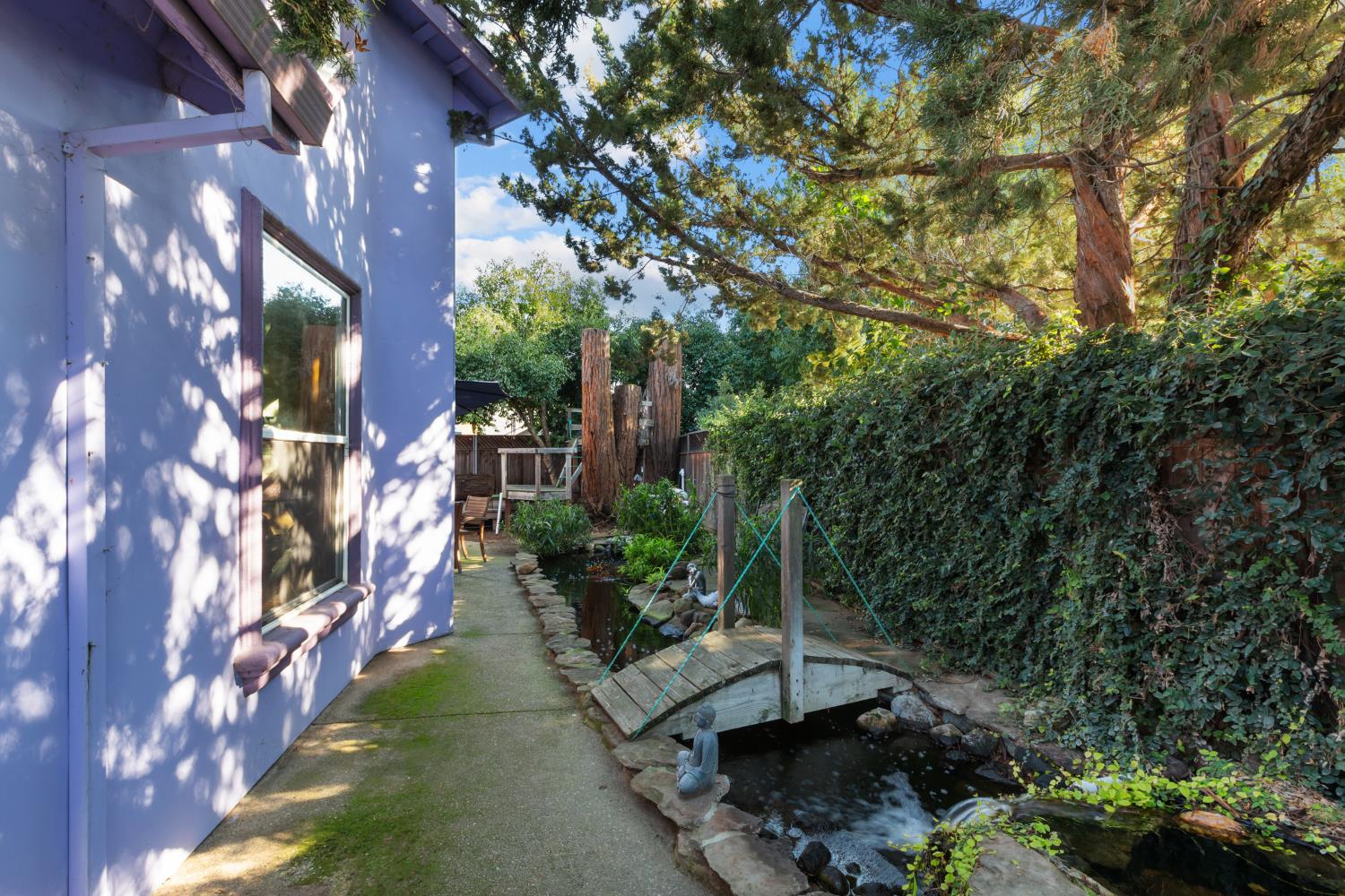 4838 Robertson Avenue Carmichael, CA 95608 - Photo 42 of 52 a view of backyard with plants and outdoor seating