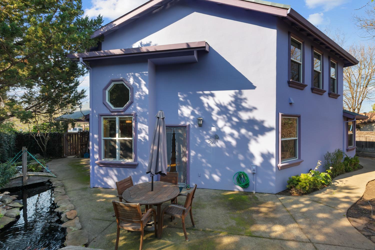 4838 Robertson Avenue Carmichael, CA 95608 - Photo 45 of 52 a view of a house with patio chairs and a fire pit