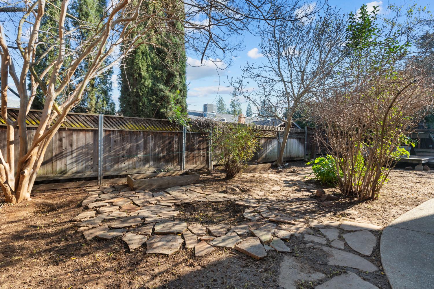 4838 Robertson Avenue Carmichael, CA 95608 - Photo 47 of 52 a backyard of a house with table and chairs