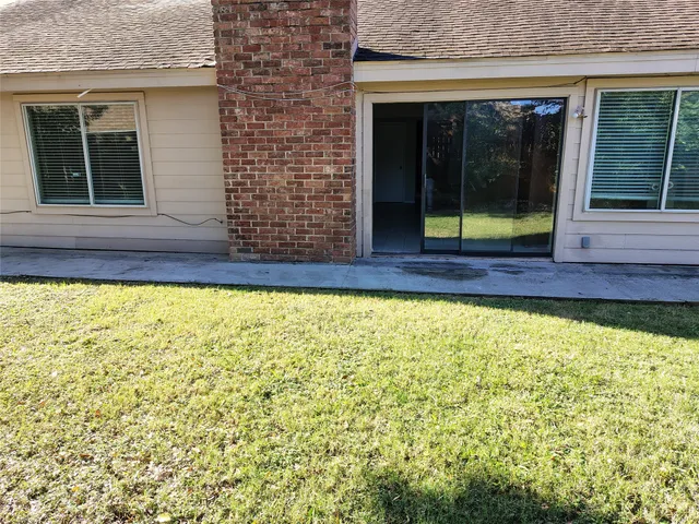 a view of a house with a large window