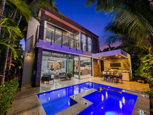 a outdoor living space with patio furniture and a potted plant