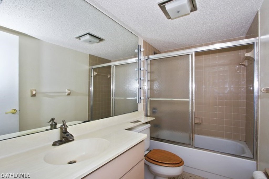 16740 Partridge Place Road, Unit 204 Fort Myers, FL 33908 - Photo 23 of 25 a bathroom with a sink toilet and shower