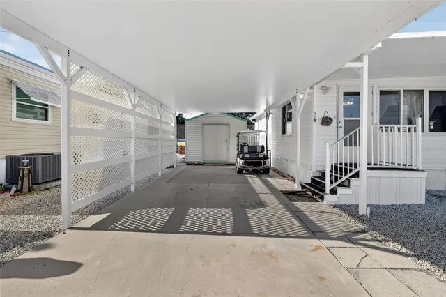 a view of a house with a sitting area