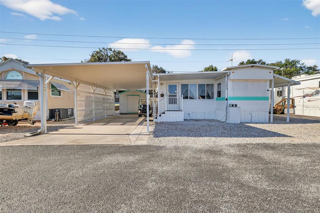 11324 Goldfinch Way Leesburg, FL 34788 - Photo 2 of 20 a view of a house with a outdoor space