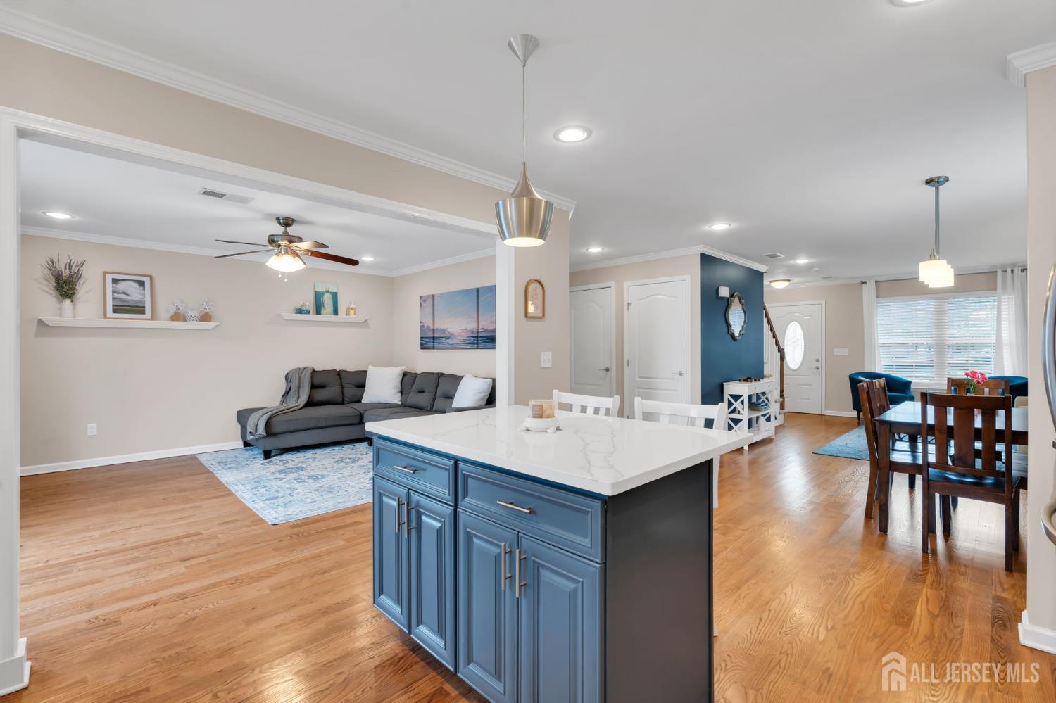 3 Harrison Avenue Aberdeen, NJ 07747 - Photo 19 of 46 a large kitchen with a table and chairs