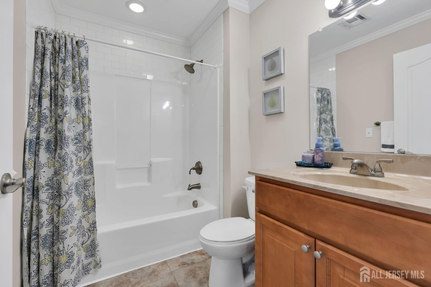 3 Harrison Avenue Aberdeen, NJ 07747 - Photo 26 of 46 a bathroom with a sink toilet and shower