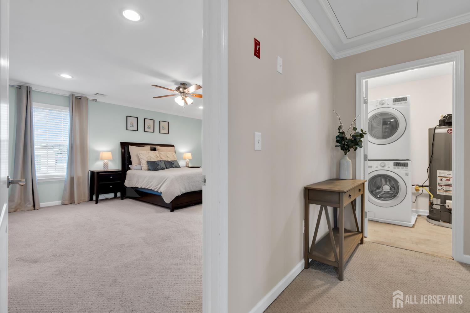 3 Harrison Avenue Aberdeen, NJ 07747 - Photo 27 of 46 a view of a bedroom with furniture and natural light